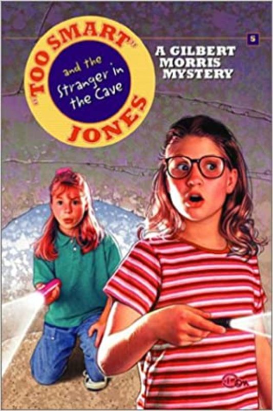 Book cover for "Too Smart Jones and the Stanger in the Cave" by Gilbert Morris