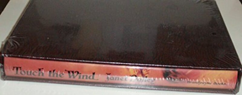 Book cover for "Touch the Wind" by Janet Dailey