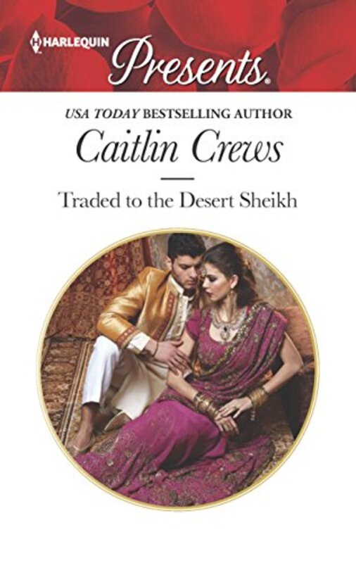 Book cover for "Traded to the Desert Sheikh" by Caitlin Crews