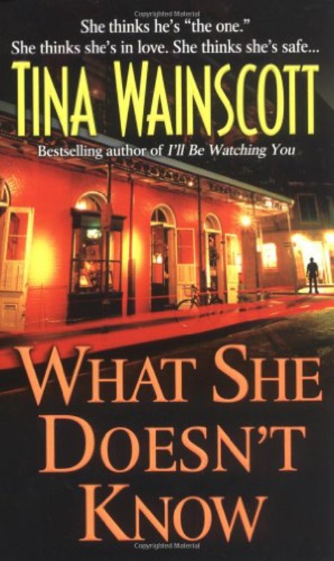 Book cover for "What She Doesn't Know" by Tina Wainscott