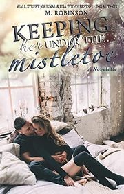 Book cover for "Keeping Her Under The Mistletoe" by M Robinson