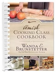 Book cover for "The Amish Cooking Class Cookbook" by Wanda E Brunstetter